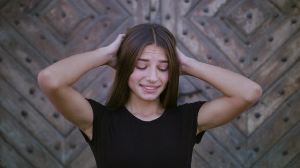 Portrait of Beautiful Young Woman with Attractive Smile