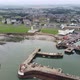 Drone View of Arbroath Harbor with a Pier and Views of the North Sea - VideoHive Item for Sale