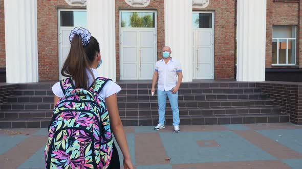 Security Guard, Using Digital Medical Electronic Thermometer, Screens Body Temperature of Schoolgirl