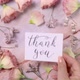 MOTHER’s DAY card on a marble table near pink flowers top view - VideoHive Item for Sale