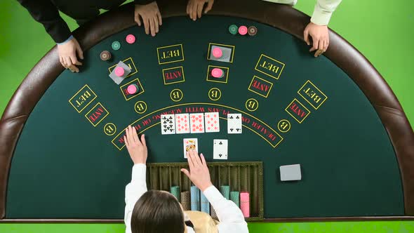 Company Plays Poker in Casino at the Table. Green Screen. Top View