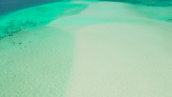 Sandy Beach in the Lagoon with Turquoise Water