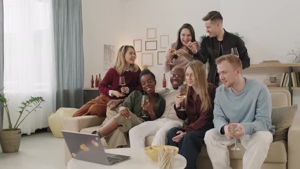 Group of Friends Watching Movie Together