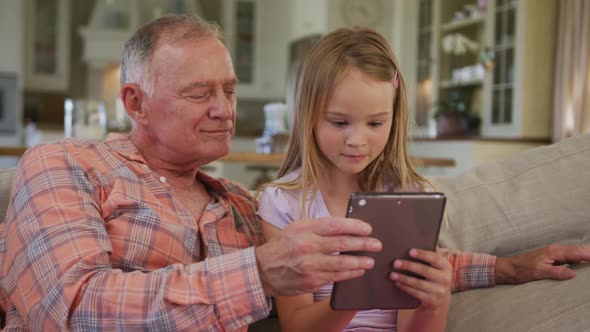 Senior Caucasian man with grandchildren