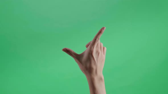 Hand Zoom Out On Green Screen Background