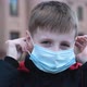 Child Boy Putting on Medical Mask for Coronavirus Prevention - VideoHive Item for Sale