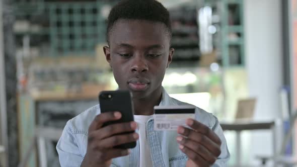 Online Payment Failure on Phone By African Man