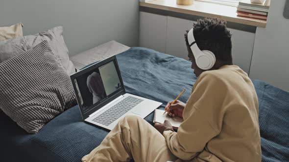 African American Man Taking Online Lesson at Home