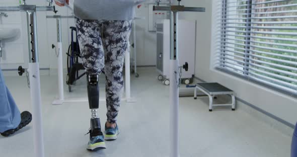 Woman with prosthetic leg at hospital