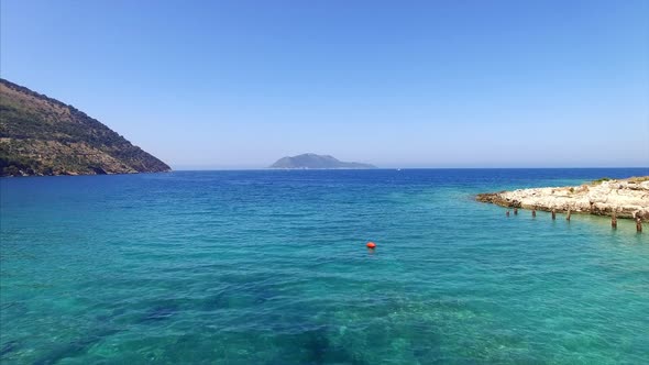 Clear ocean with mountains in Albania