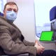 Millennial Man in Medical Mask Rides on Train and Tablet Computer with Chroma Key Green Screen - VideoHive Item for Sale