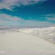 Aerial View Snow Mountain Peak Clouds in Background  Winter Drone Footage Ski Resort - VideoHive Item for Sale