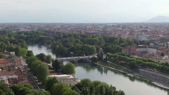 Beautiful bridge over river Po and cityscape of Turin, aerial drone view