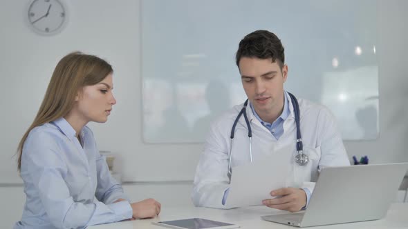 Doctor Giving Prescription to Patient Medical Documents