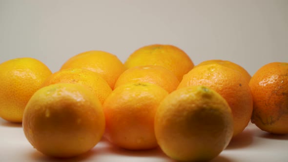 Bunch Of Riped Oranges On Top Of The Table - Close Up Shot