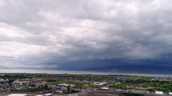 Hyperlapse of summer rainstorm moving in over mountains at Utah Lake