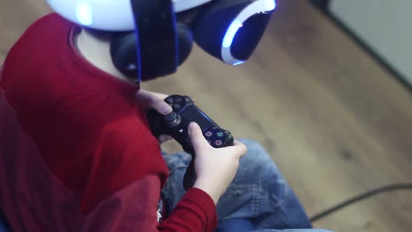 Boy In The Helmet Of Virtual Reality