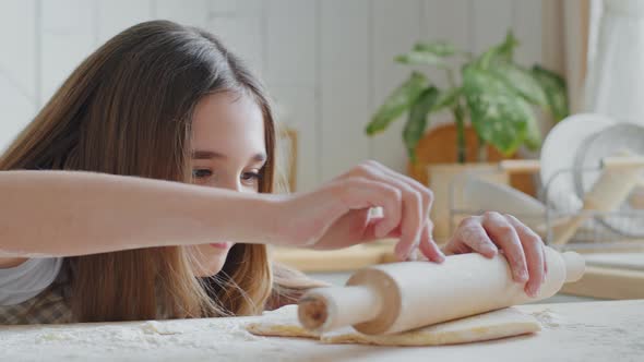 Portrait Excited Teen Girl Kid Daughter Caucasian Child Using Rolling Pin Trying Preparing Dough for