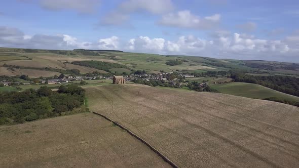 Aerial tracking and rotating from right to left around the stunning St Catherine's Chapel, near Abbo