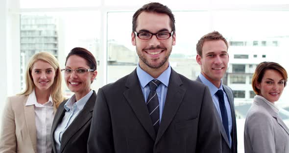 Smiling Business Team Posing for Camera