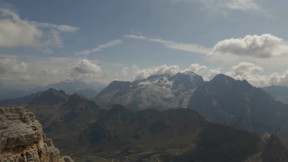 Dolomites in Val Gardena, Italy. Astonishing panorama, high mountain peaks with sky and clouds durin