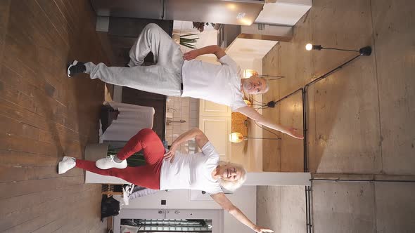 Sports Man and Woman 6070 Years Old Do Morning Exercises and Sports Exercises for Health at Home