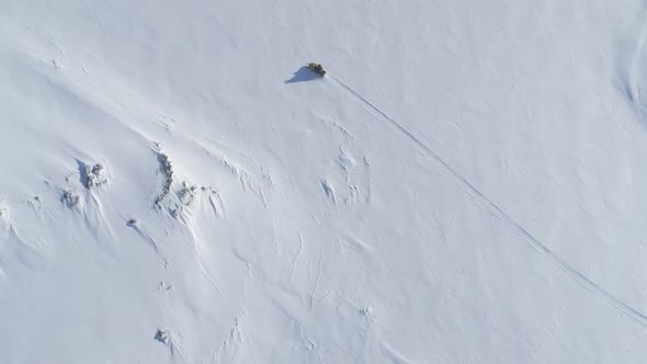 Ski-doo Ride Snow Surface Aerial Tracking Shot