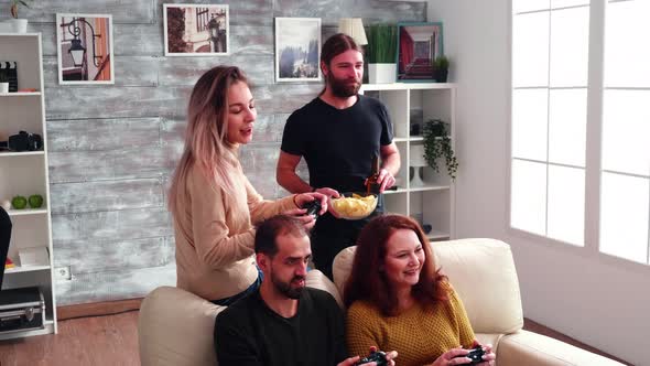 Two Young Woman Playing Online Video Games