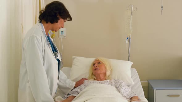 Doctor talking to patient