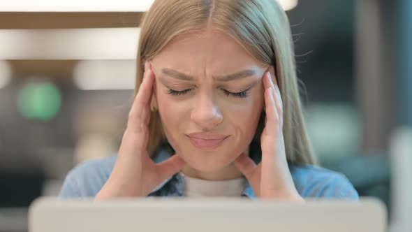 Close Up of Woman Having Headache While Using Laptop