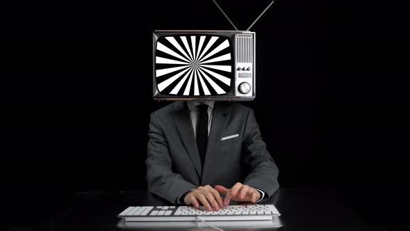 Man Typing TV Head Showing Hypnotic Pattern Screen