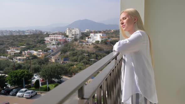 Young Beautiful Woman Admiring the View