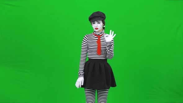 Mime Girl Listening To Someone, Agreeing, Then Refusing. Chroma Key