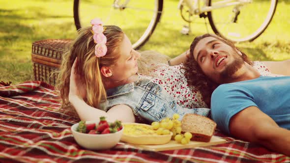 In high quality 4k format cute couple having a picnic