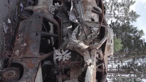 Vertical Video of the Consequences of the War in Ukraine  Destroyed Cars