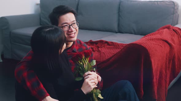 Happy Asian Couple Spending Valentines Day Indoors