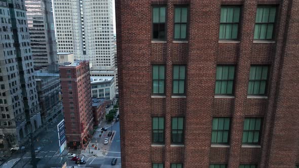 Apartment and office building reveal to street traffic below. Life in urban USA city.