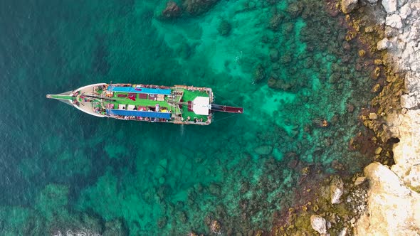 A Large Yacht Stands at Sea Aerial View 4 K