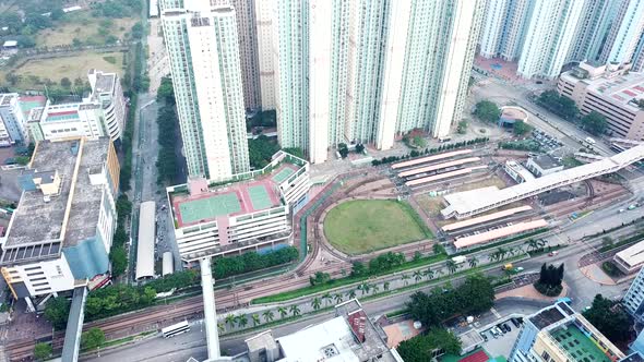 Fly drone over residential district in Hong Kong city