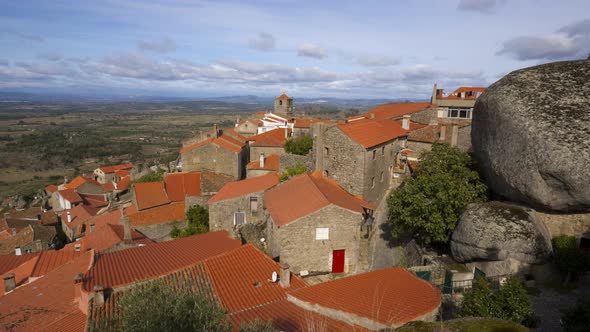 Monsanto historic village with stone boulder buildings and rooftops, in Portugal