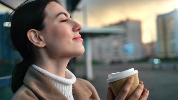 Happy Modern Woman Dreaming Contemplating Evening City Landscape