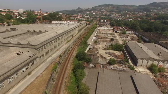 Railway Surrounded by Abandoned Factory