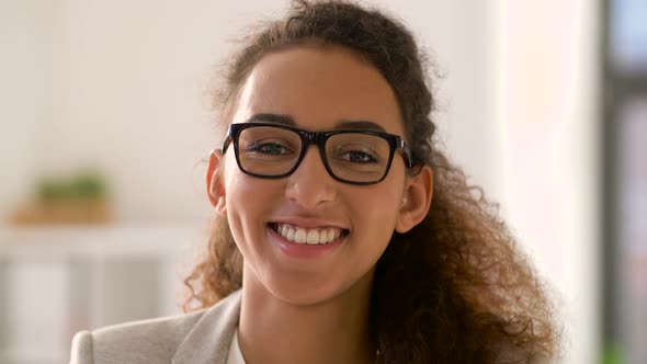 Face of Smiling African American Woman in Glasses