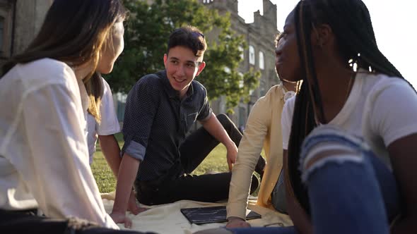 Group of Diverse Mates Spending Leisure Outdoors