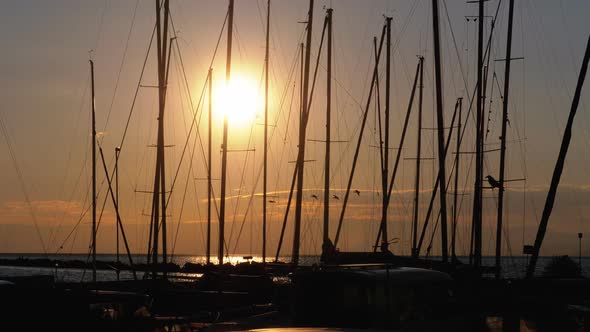 Silhouettes of Parked Pleasure Yachts at Sunset in Port on Lake of Geneva, Montreux, Switzerland