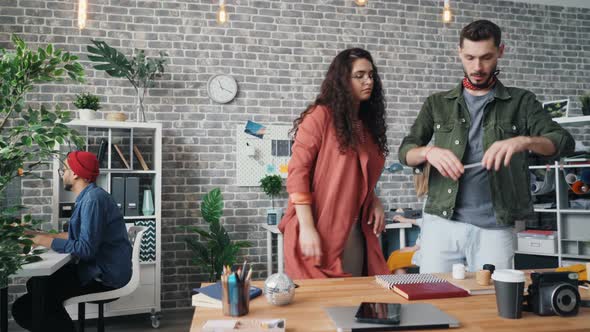 Hipsters Designers Using Smartphone To Shoot Flat Lay on Office Table