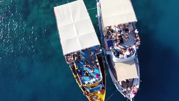 Drone shot of the boats at the sea.