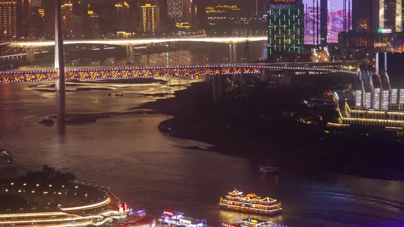 Chongqing Night City River Cityscape with Bridges Aerial China Timelapse Pan Up