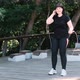 Plump Girl Jumps Rope in the Park - VideoHive Item for Sale