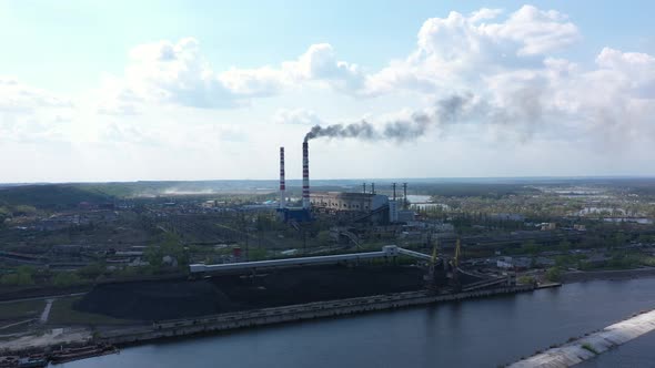 Incinerator With Smoking Chimneys